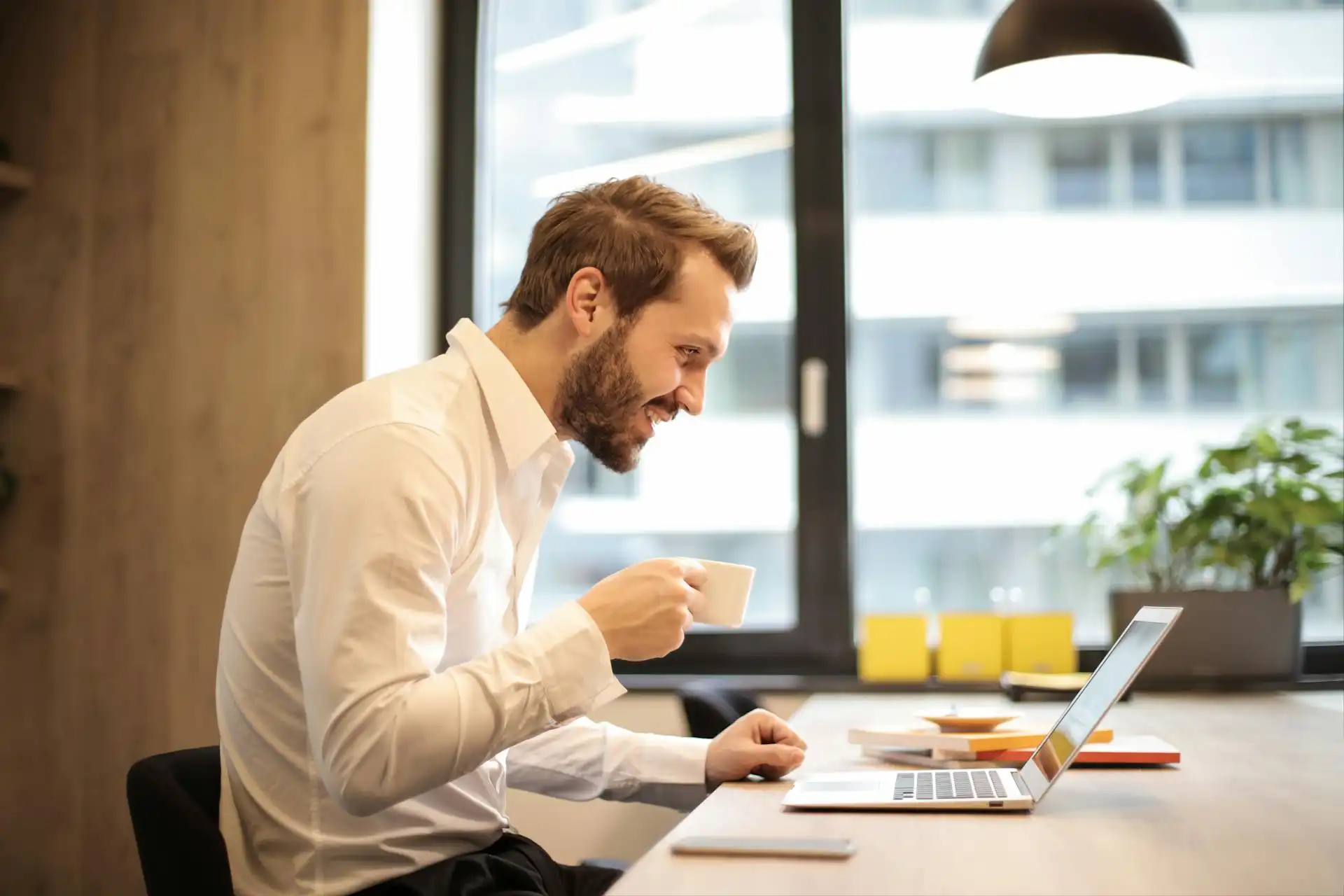 A small business man owner is very happy with his business wordpress website